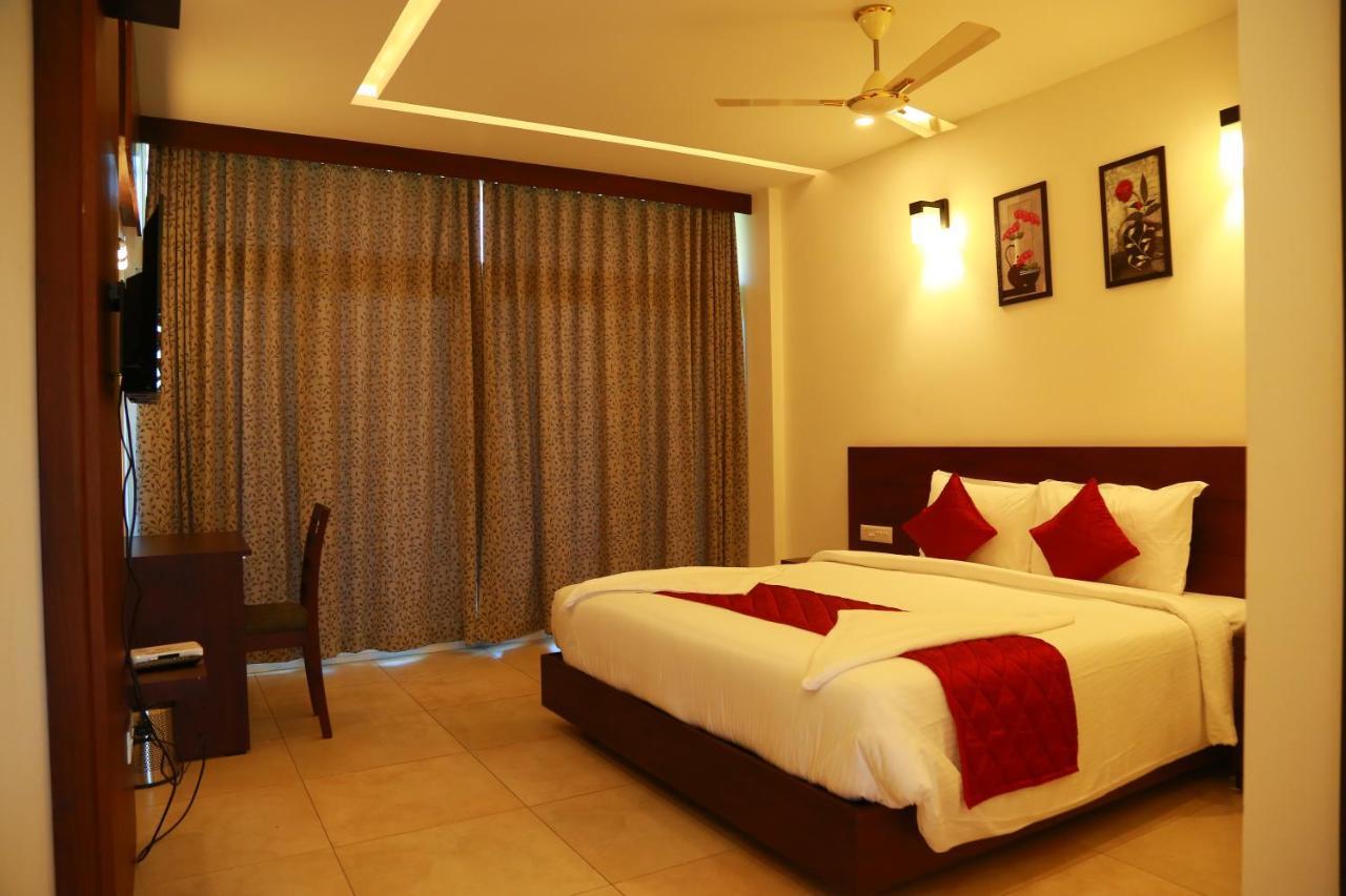 Hotel Palmtree Leaf, Munnar Extérieur photo